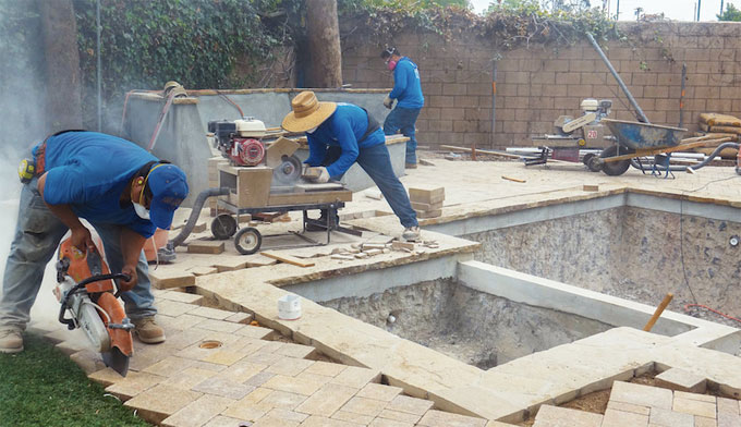 Why pouring concrete over present concrete slab is not recommended